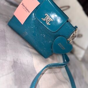 Juicy Couture Blue Crossbody Bag with Glossy Finish and Structured Design